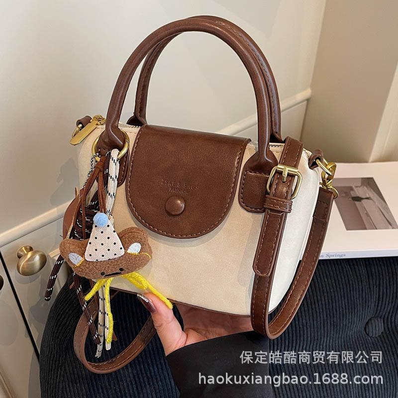 Retro handbag women's 2025 new trendy high-end color contrasting fashion shoulder bag commuter messenger dumpling bag