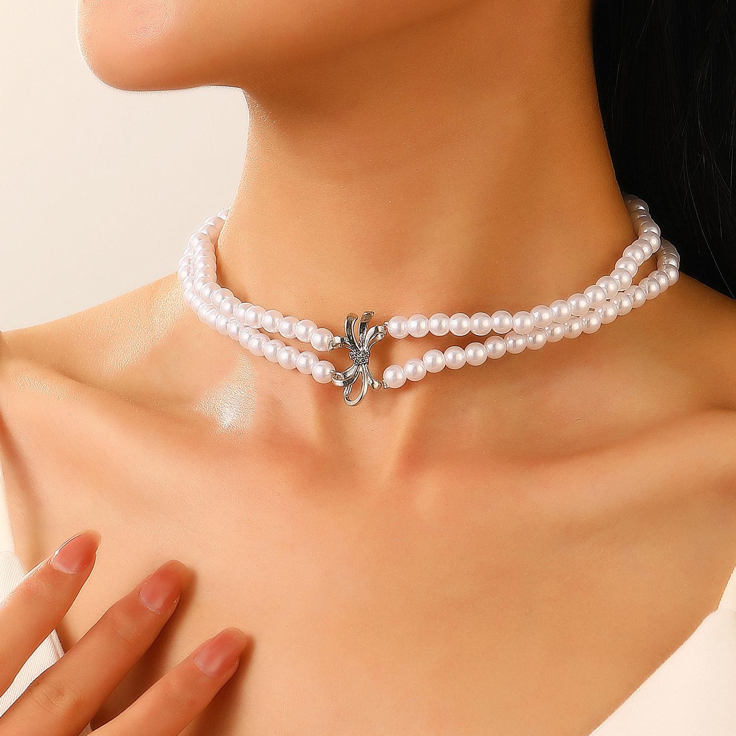 

Жіночий ювелірний набір високого класу в європейському та американському стилі: Двошаровий перловий чокер, намисто на ключицю, браслет та сережки