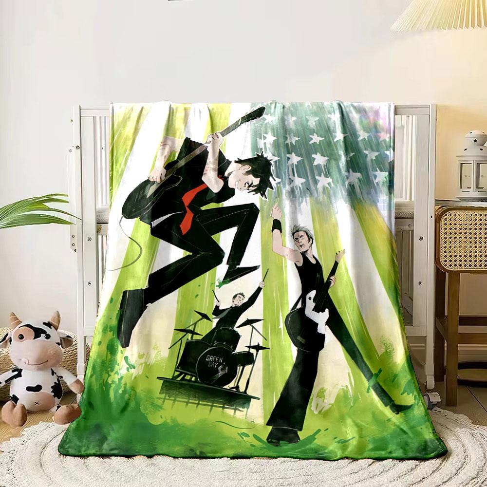 

Band performing energetically with guitars, drums, and green starry backdrop. for all seasons blanket lunch break throw gift 80cm x 120cm