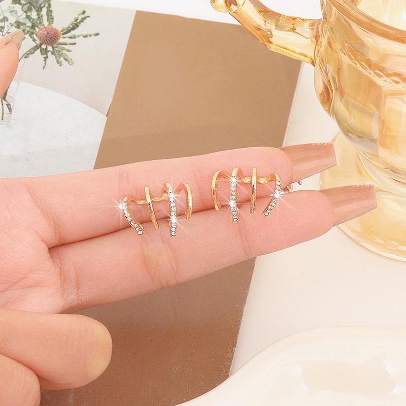 Orecchini a bottone di lusso con diamanti 2023: Set Artigli, Stile Freddo, Design di Alta Gamma, Moda di Nicchia