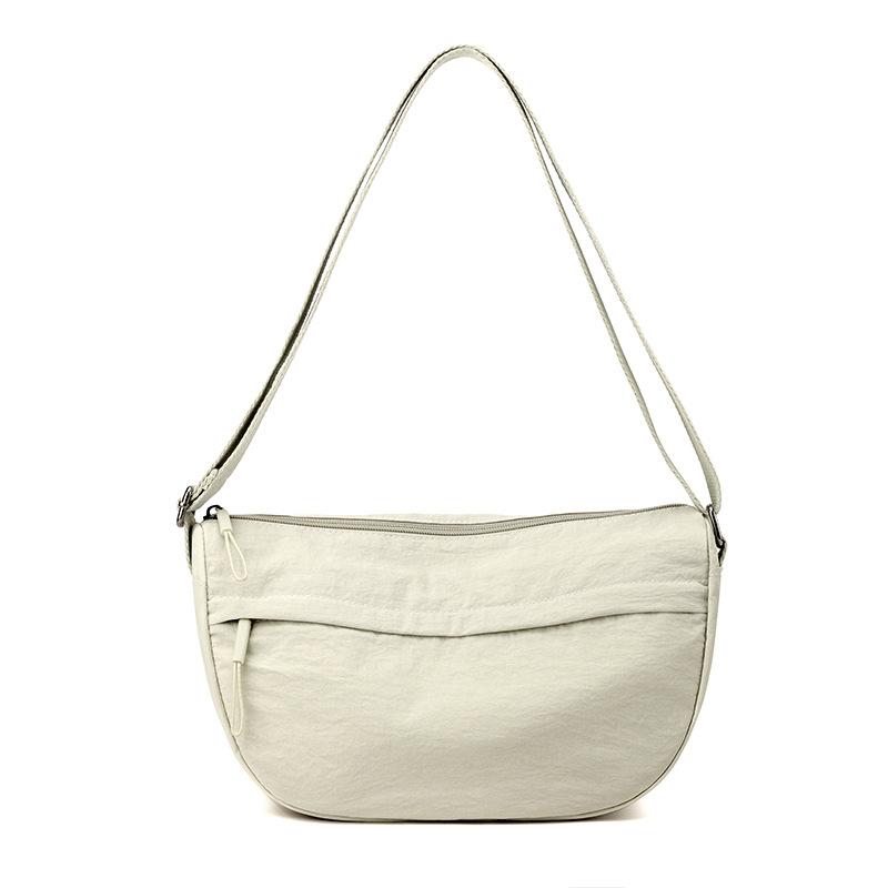 Korean Version of Solid Color Simple Messenger Bag Nylon Joker Leisure Saddle Bag Large Capacity Texture Commuter Portable Shoulder Bag.