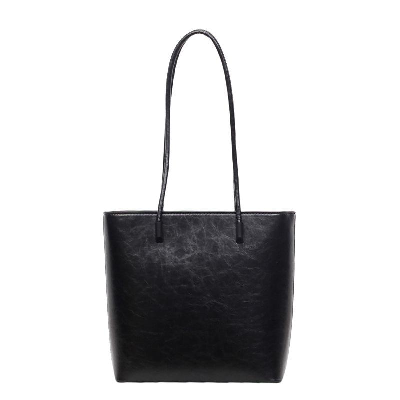 

Korean version of fashion commuter large-capacity bag women s 2025 summer new retro casual tote bag shoulder armpit bag чорний