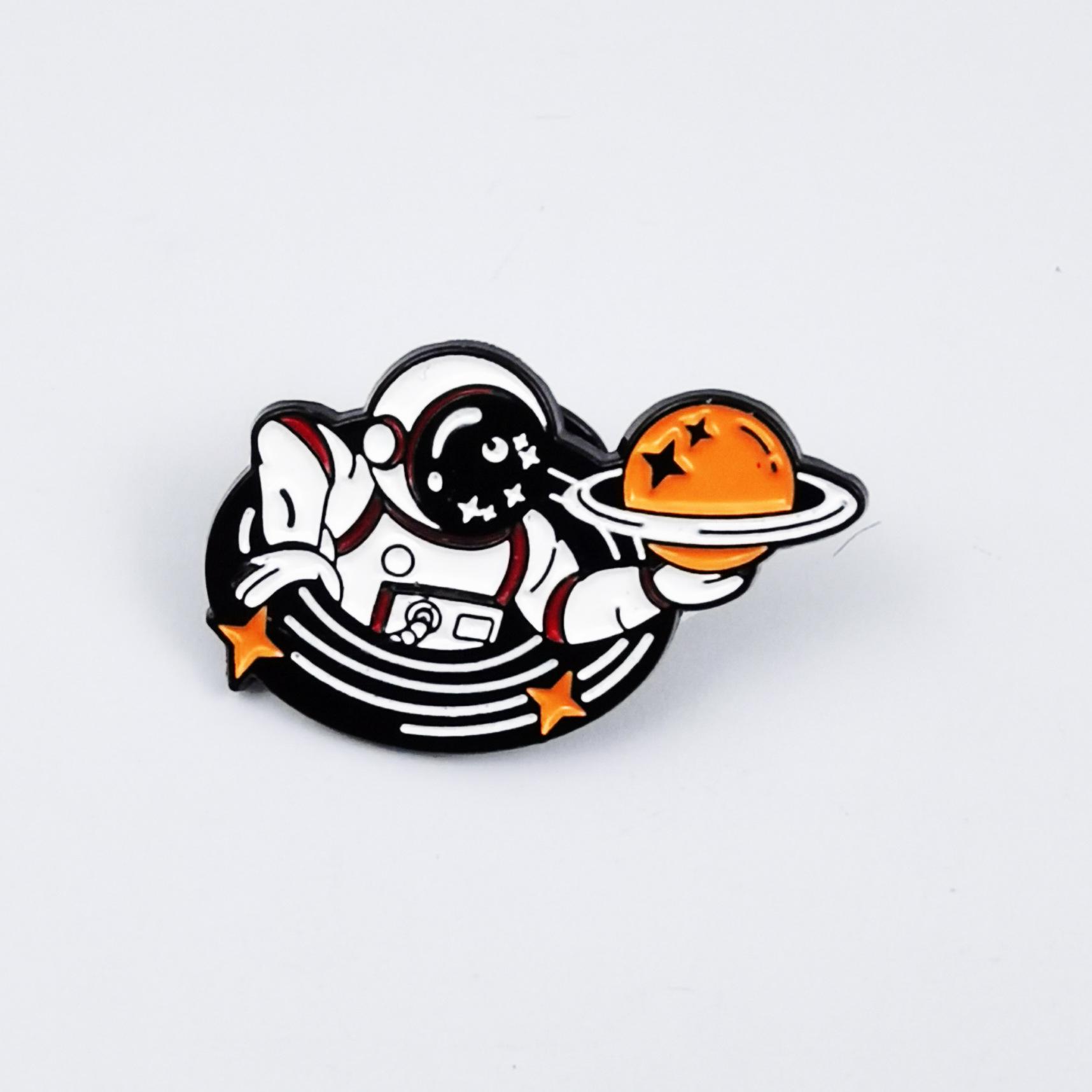 Customized Astronaut Brooch: Drip Oil Alloy Planet Badge for Backpack Decoration.