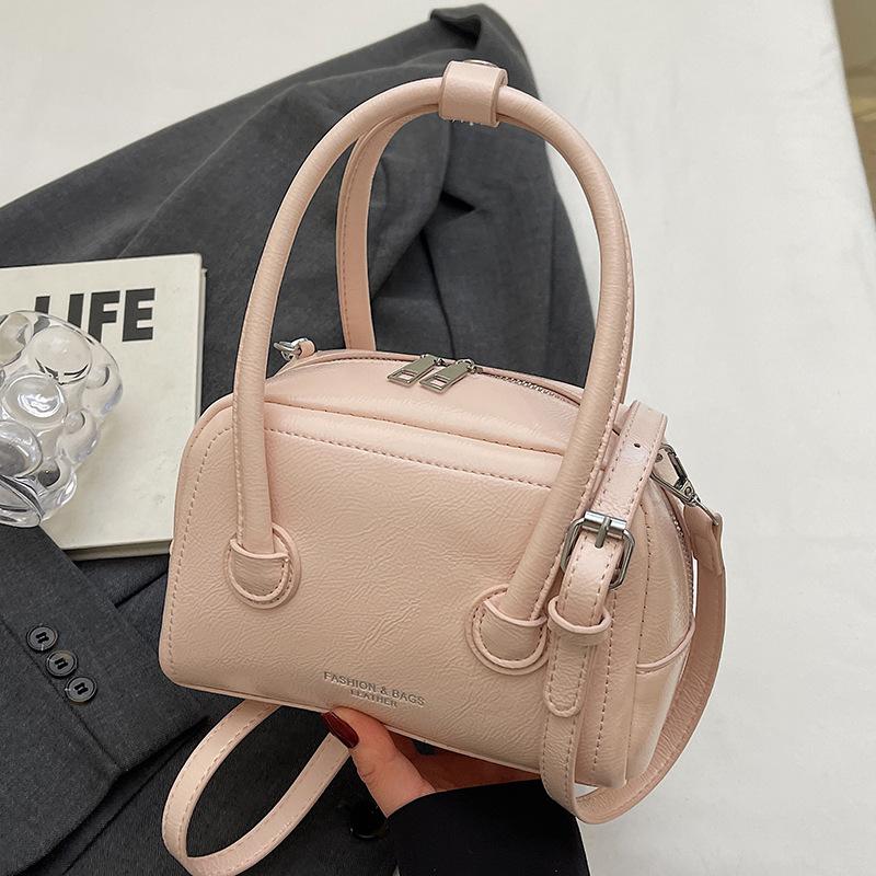 Summer new fashion simple style Korean version sweet portable pillow bag high sense versatile commuter messenger women's bag