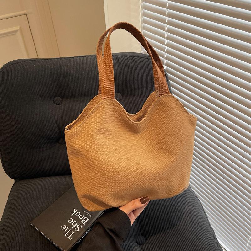 Niche Simple Tote Bag Women's New Personalized Versatile Casual Handbag Literary Canvas Handbag