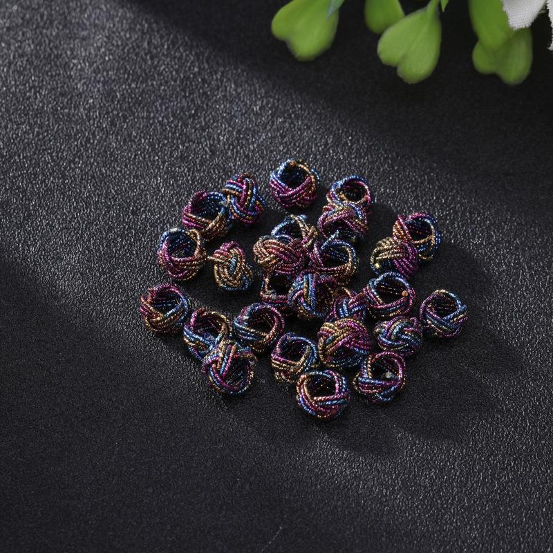 Exquisite Gold Ring with Wire Coil, Gold & Silver Buckle, and Woven Knot Ball