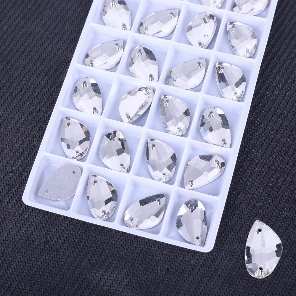 

Золотая рыбка Плоское дно Стекло Ручной шов Сверло Цвет Двойное отверстие Разноцветный Кристалл АБ Плоская пряжка, Стеклянный страз Материал для DIY 9 * 14mm 28pcs/bag белый