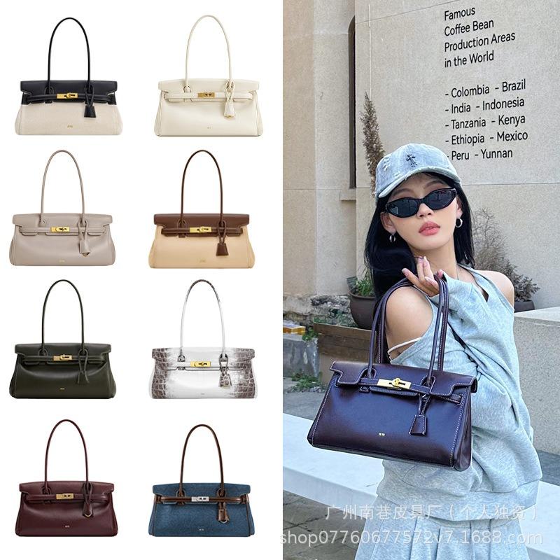 Borsa da lavoro da donna nuova borsa portatile a spalla/sottobraccio design di nicchia borsa baguette
