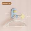 Stretchable Hanger Storage Rack - A Household Hanger Storage Solution That Uses Suction Cups and Doesn't Require Drilling Holes.