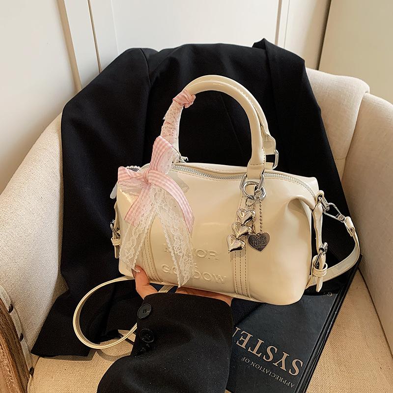 Fashion niche hand carry bowling bag women 2025 new Korean version trend high-end shoulder bag versatile messenger bag
