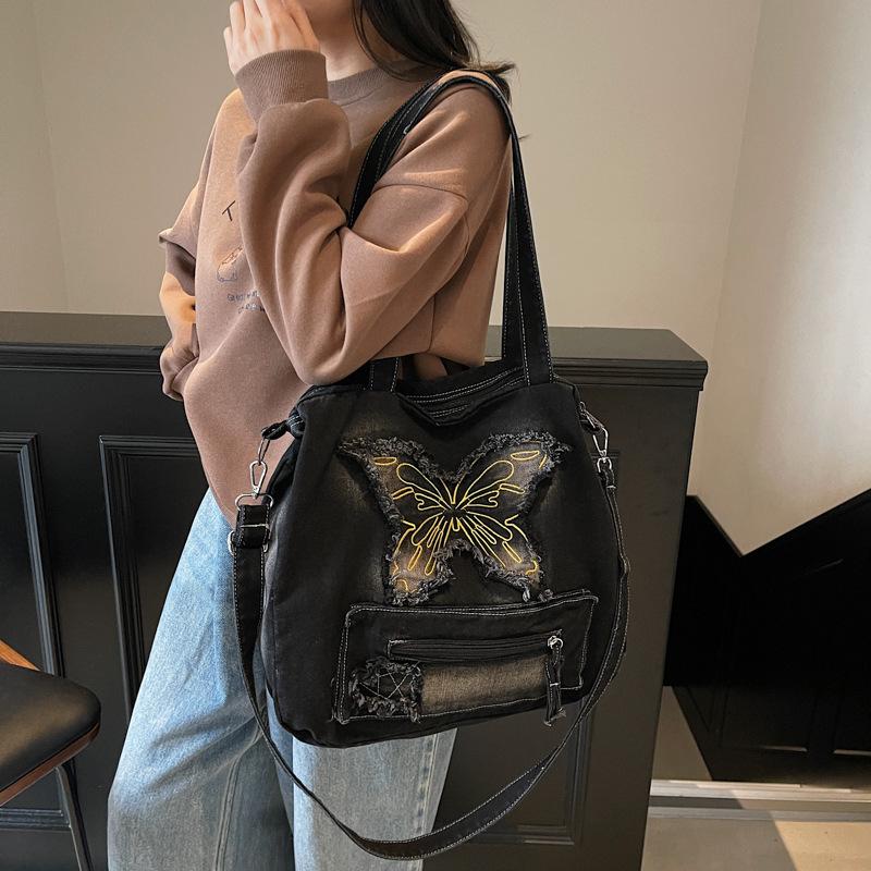 New fashionable large-capacity contrasting color washed denim versatile casual ins wind shoulder portable student commuting bag