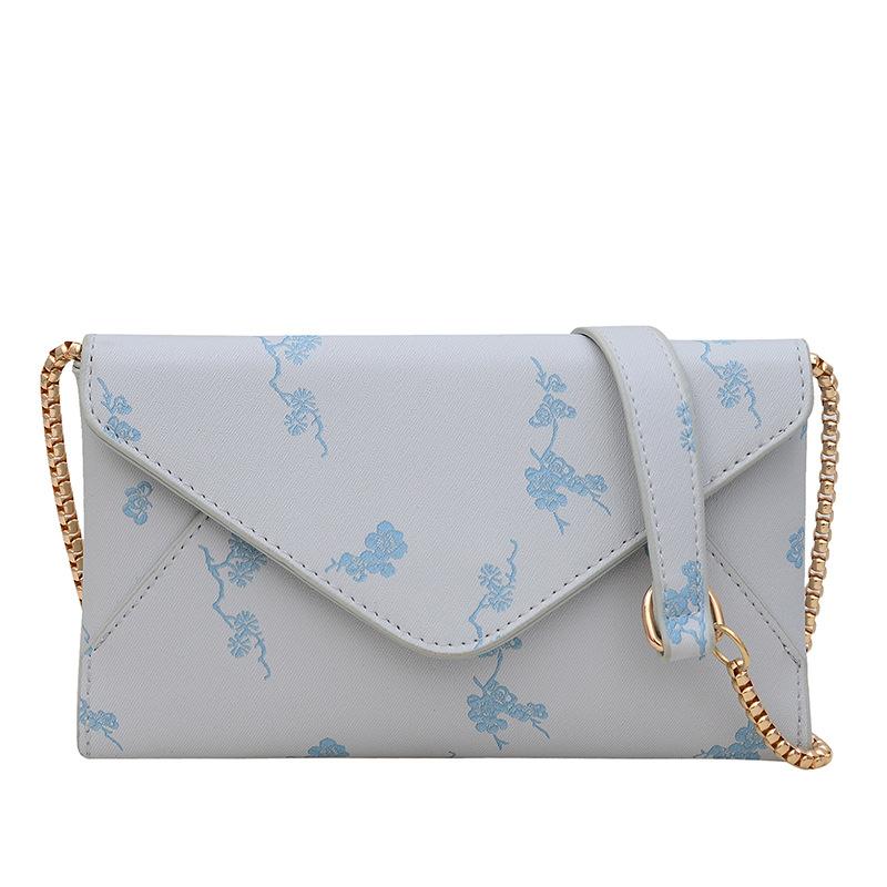 

Trendy and fashionable new envelope women s bag 2024 summer personalized fashion shoulder bag simple foreign style chain oblique span bag синій
