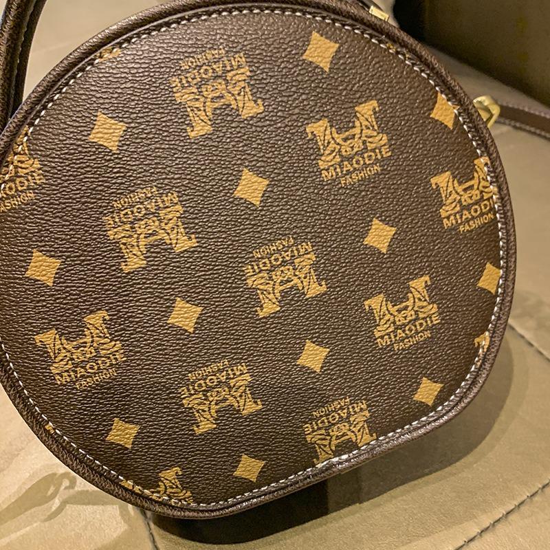 Bag women's new versatile messenger bag fashionable texture shoulder bag portable small round bag