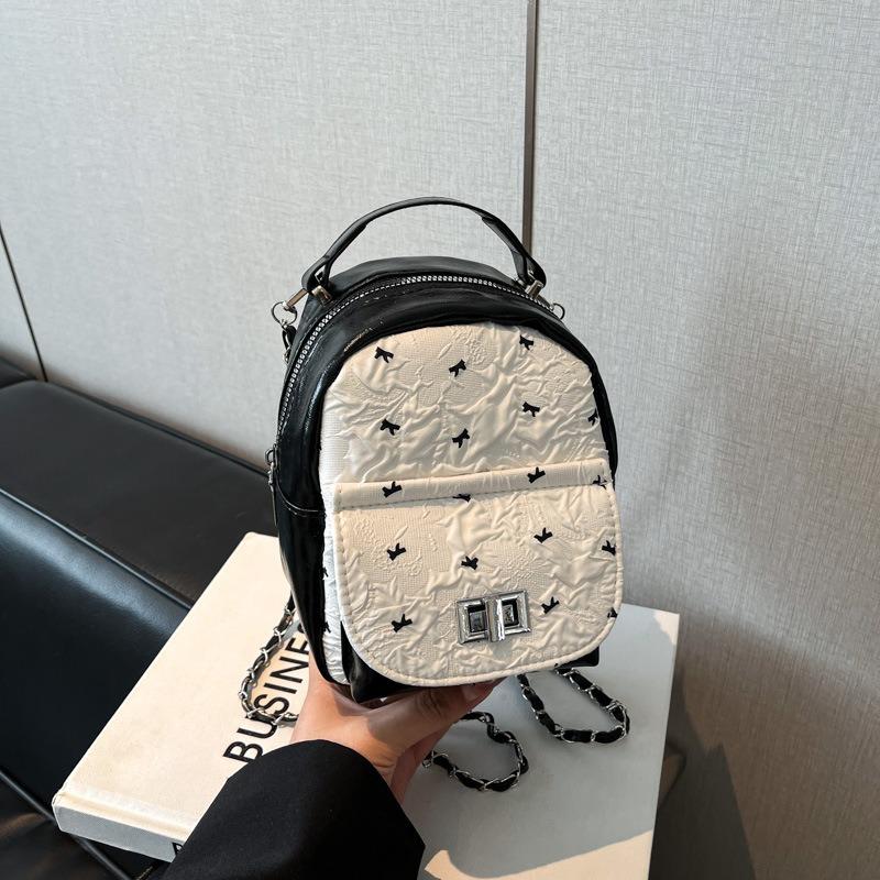 

Contrasting color niche women s backpack new trendy exquisite mini versatile chain rear backpack small schoolbag