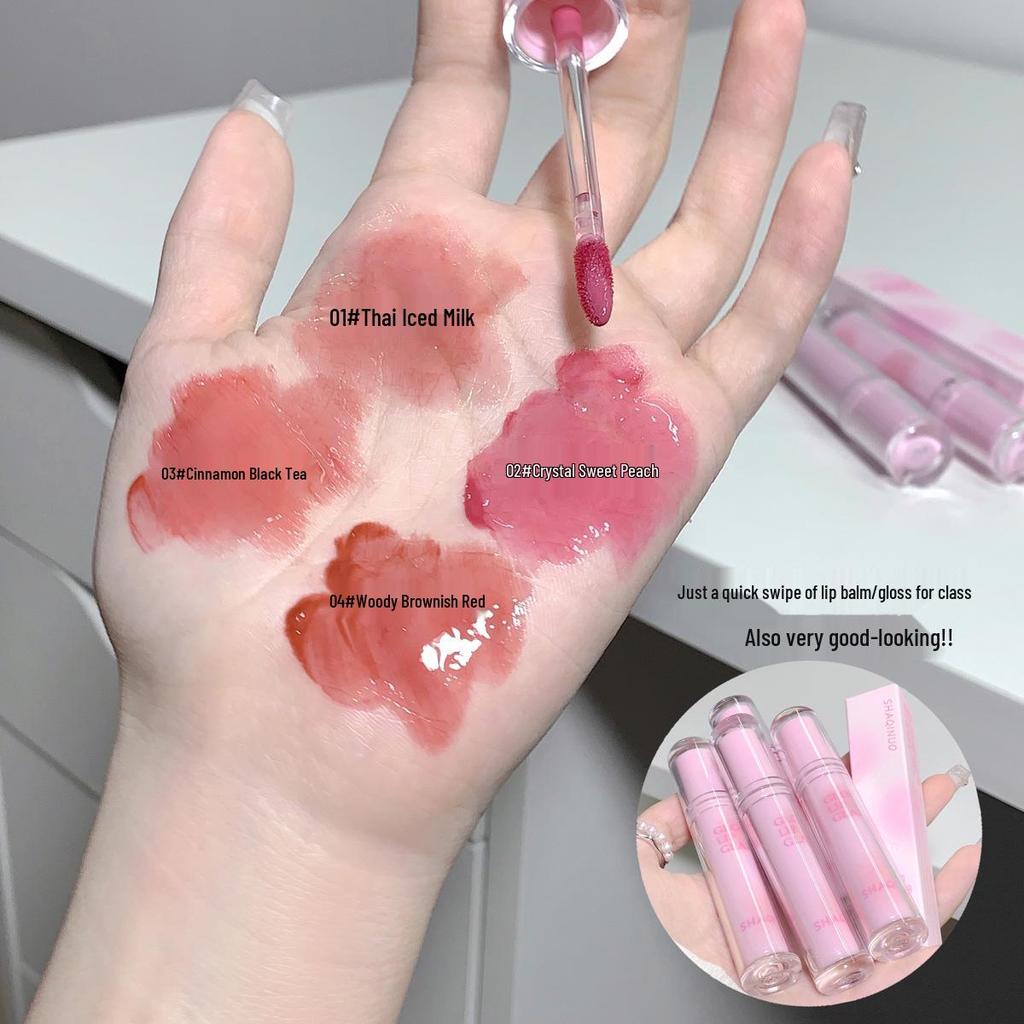 Shaqinuo Moisture-Rich Lip Glaze: Plumps & Enhances Lips with a Natural Shine, Long-Lasting Color, and a Watery Gloss Finish.