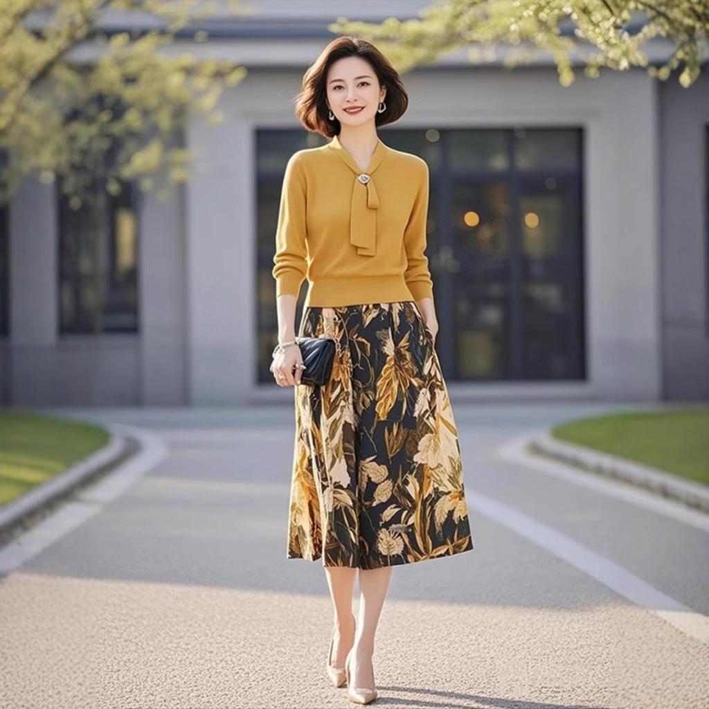 Yellow Knitted Two-Piece Set: Tie-Up Top & Printed Midi Skirt for Spring 2025 Women