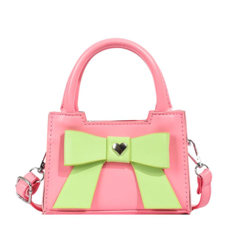 Stylish Korean Toddler Shoulder Bag For Kids Featuring Chic Color Block Design And Sweet Bow Detail