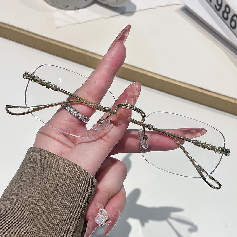 Hot Selling Photochromic Square Rimless Fashionable Fancy Metal Frame Glasses for Women and Men Fashion&Metal