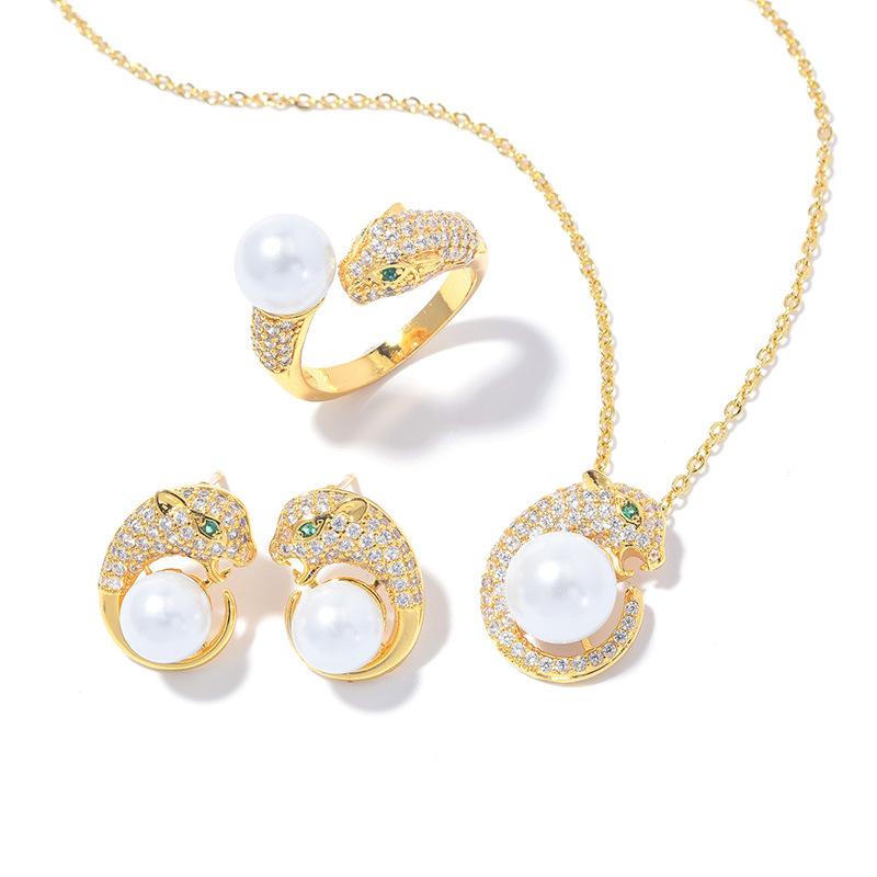 

Новый комплект с жемчужной инкрустацией, летняя женская корейская версия, ювелирные изделия с головой леопарда, модные, простые и универсальные Open Ring