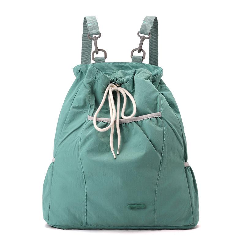Niche design women's casual backpack college wind lightweight drawstring backpack