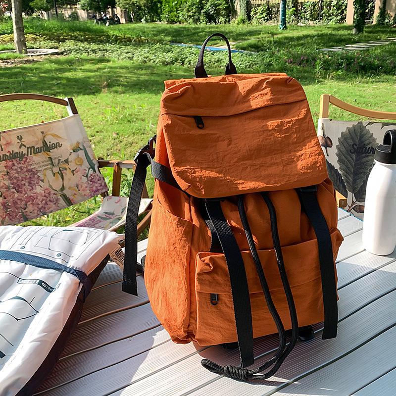 Japanese ins style school bag female college student outdoor mountaineering trip backpack light and versatile boy high school student backpack
