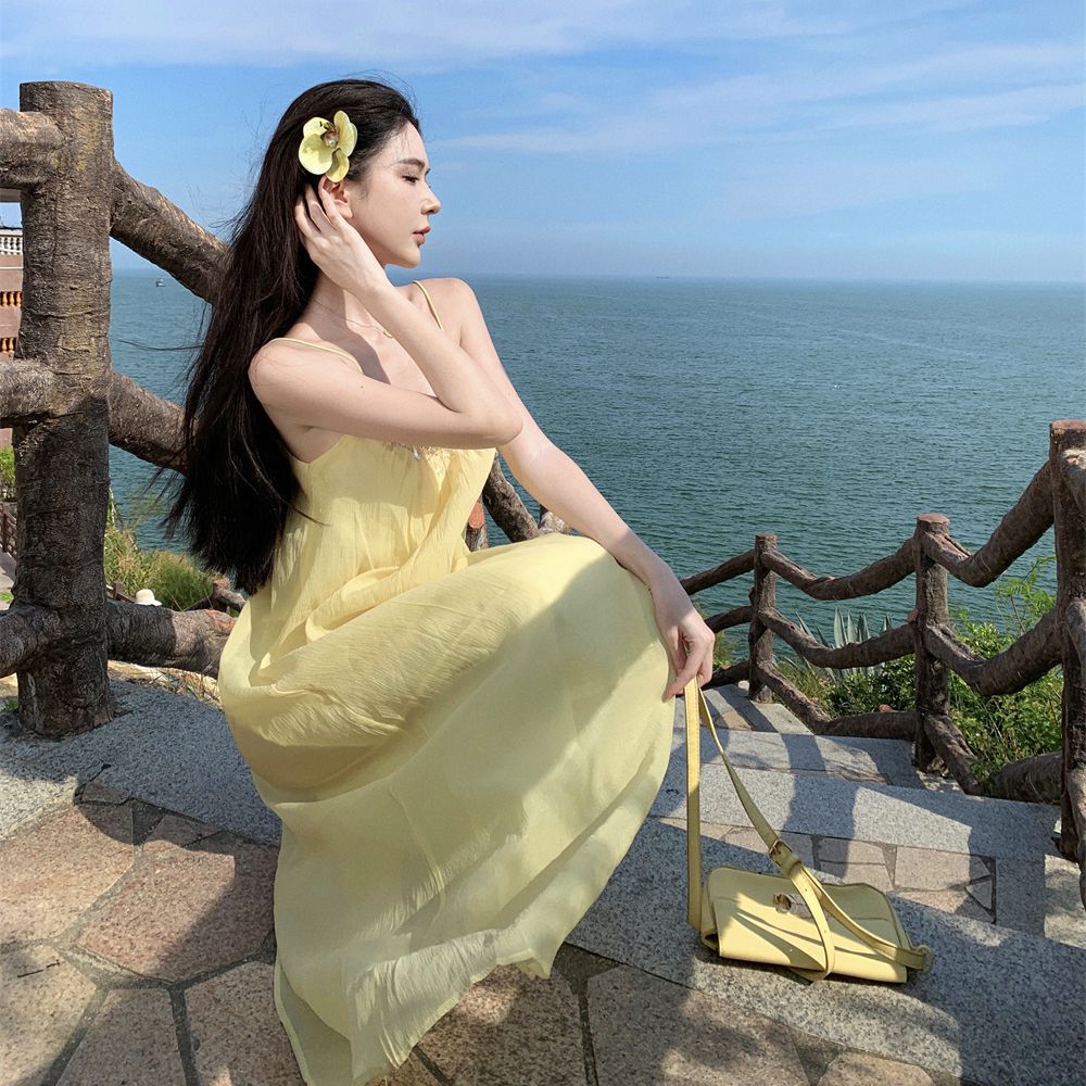Sanya seaside travel and vacation super fairy suspender dress summer new loose and thin eye stunning beach dress
