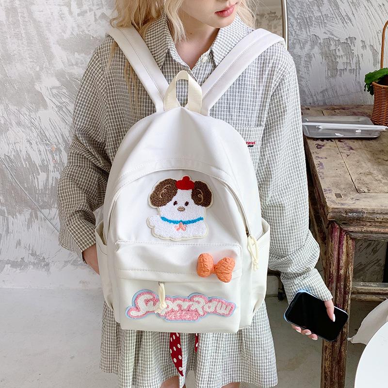 Korean version ins style new girl cute cartoon puppy large capacity primary school students junior high school students backpack leisure bag