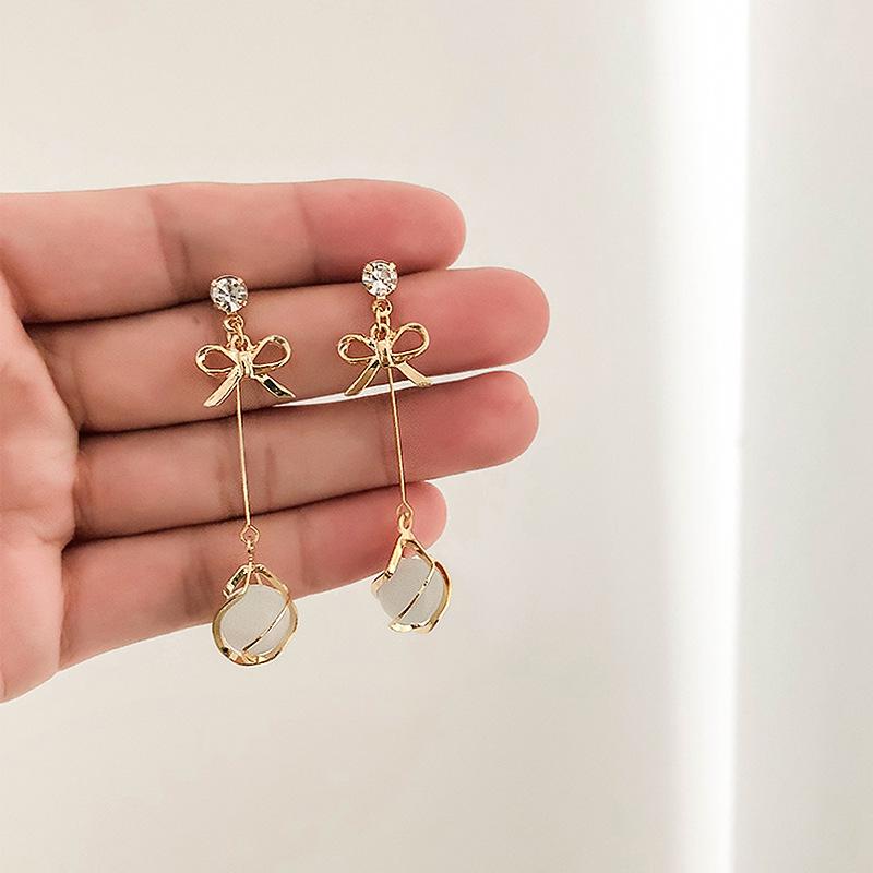Korean Style S925 Silver Bow Earrings with Cat's Eye Stone Pendant and Tassel