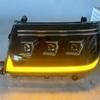 Compatible with Toyota Land Cruiser LC100 1998-2007 Headlight Assembly with LED Daytime Running Lights and Turn Signals.