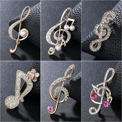 Broche de metal con forma de nota musical y diamantes de imitación para mujer, con hebilla para bufanda, insignia de solapa, broches de joyería de lujo, accesorios