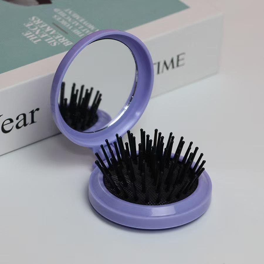 

Compact Airbag Comb & Makeup Mirror with Cushion Head