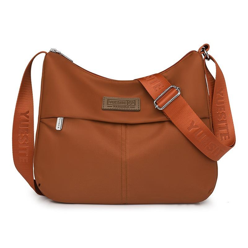 Einfacher und großzügiger Schulterrucksack Vielseitige, spritzwassergeschützte Nylontasche mit großem Fassungsvermögen Modetrend schräg getragener Damenrucksack