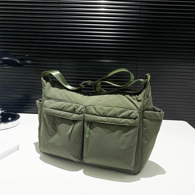 Unisex vodoodpudivá nylonová crossbody taška s více kapsami