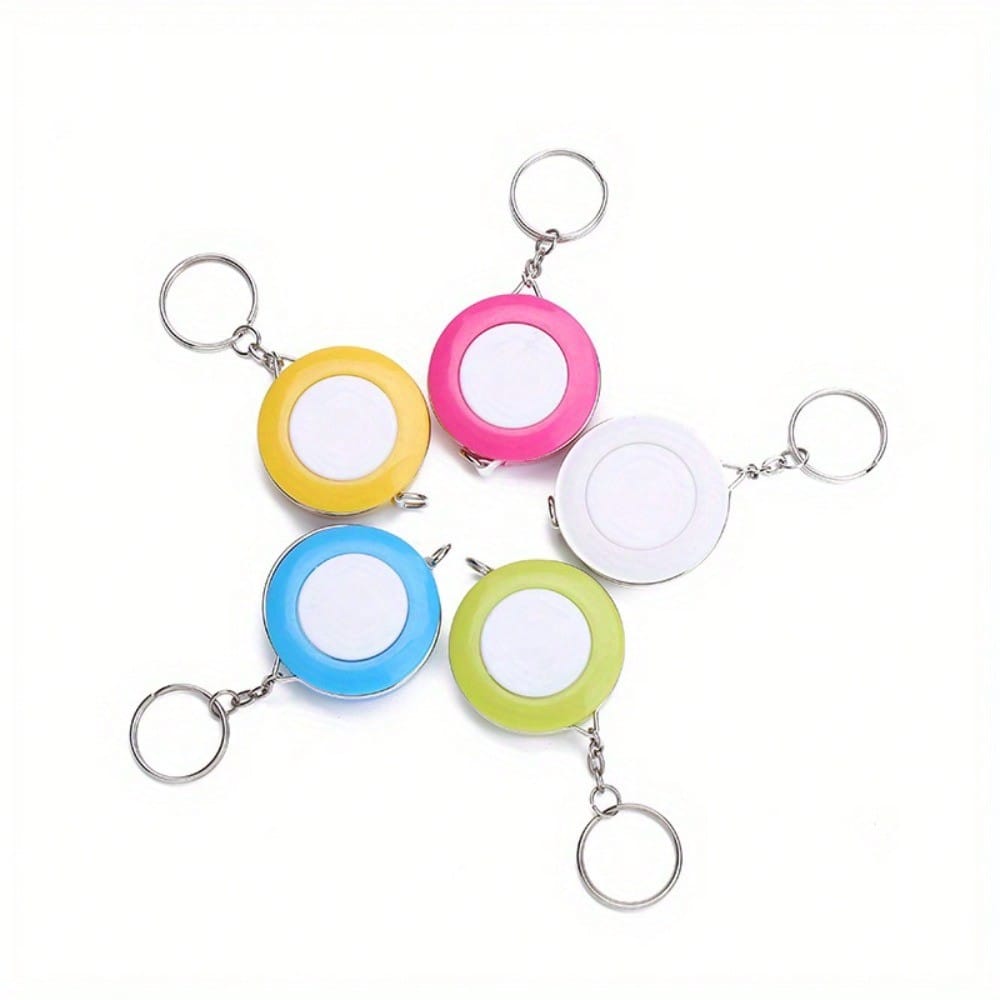 A Stylish Keychain Measuring Tape In Vibrant Colors, Featuring A 1.5-Meter Retractable Design, Perfect for Measuring Clothing Sizes