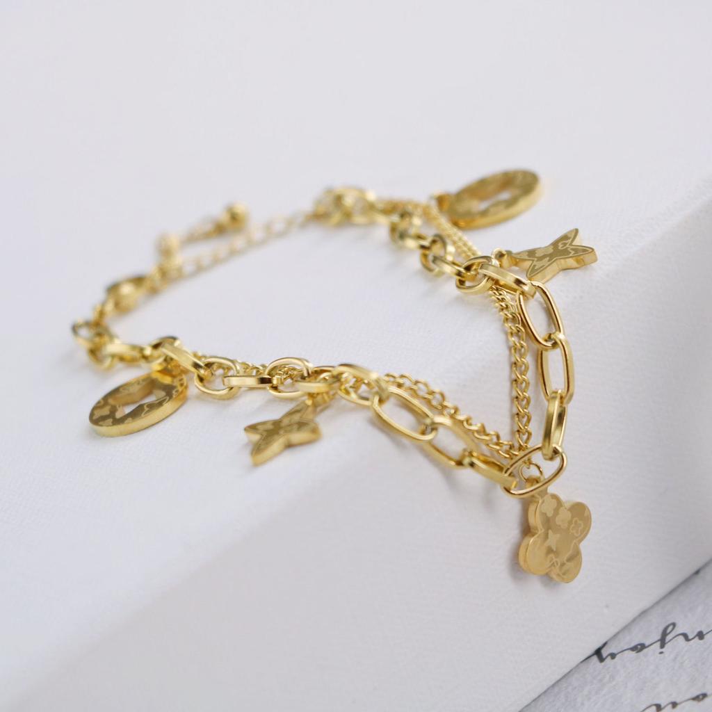Fashion Four-Leaf Clover Tassel Bracelet Women Do Not Lose Color Day Prismatic Small Flowers Titanium Steel Bracelet Hand Jewelry
