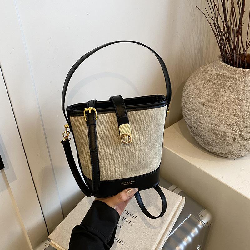 Retro casual texture contrasting color bucket bag 2025 autumn and winter new fashionable versatile simple portable shoulder messenger bag