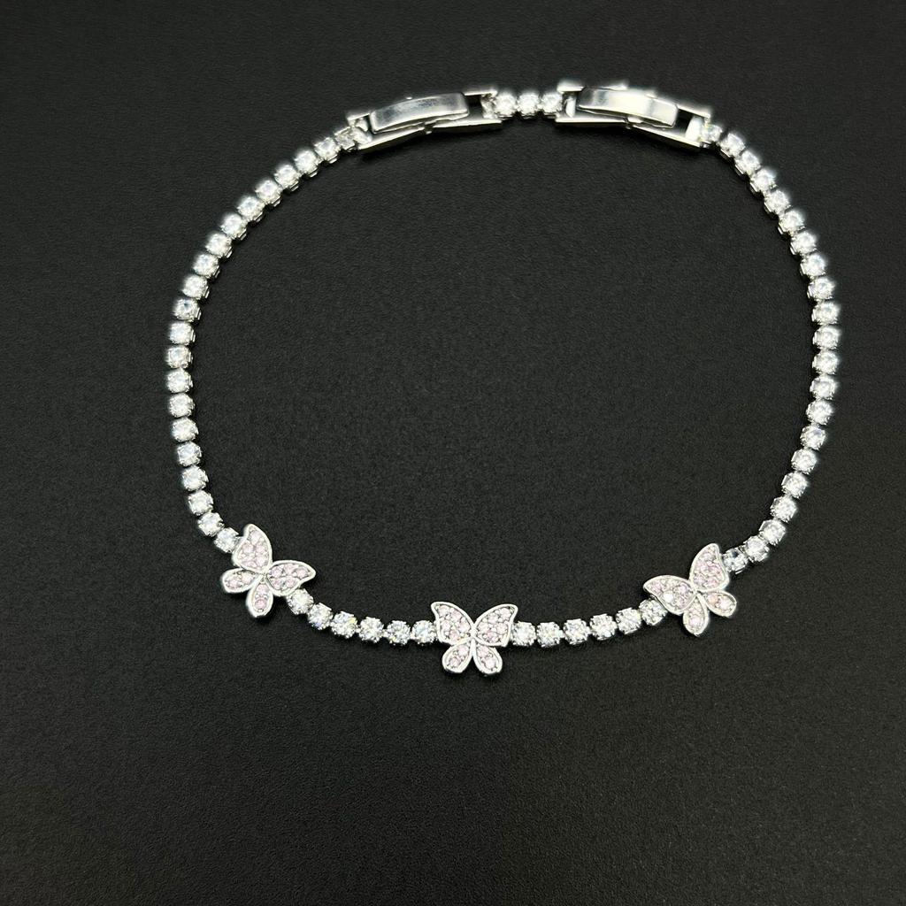 Luxuriöses Damenarmband mit Schmetterlings-Zirkonia und Leopardenkopf - Funkelnder High-End-Stil
