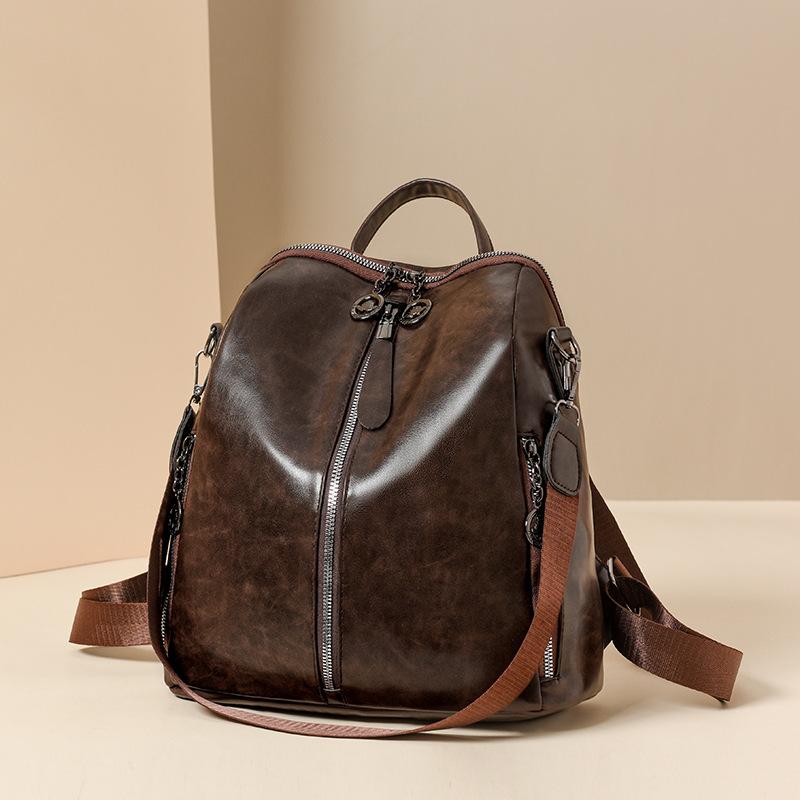 Ein Retro-Freizeitrucksack aus weichem Leder für Damen, eine modische und vielseitige Pendeltasche