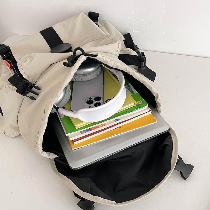 New outdoor large-capacity waterproof and lightweight backpack women's travel mountaineering computer backpack male student schoolbag