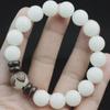 Creative White Jade Bodhi Bracelet with Personalized Lotus Seed Beads, Unisex Cultural Accessory.