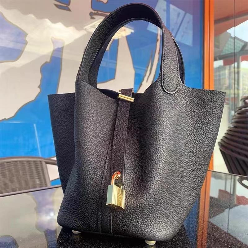 Hochwertige halbhandgefertigte Gemüsekorbtasche togo erste Schicht Rindsleder Pendlertasche echtes Leder tragbare Beuteltasche Damen 18cm