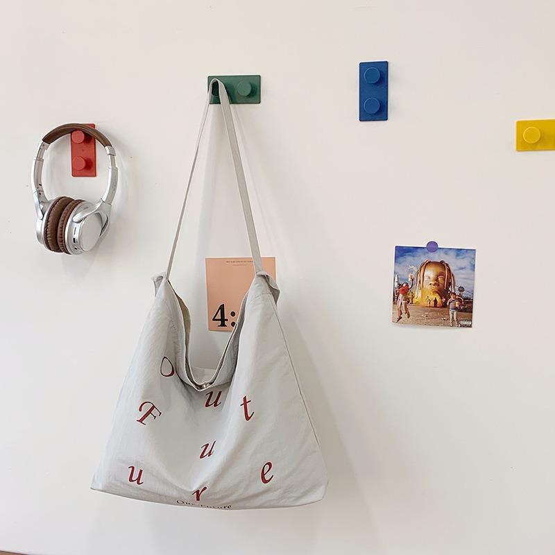 

Nylon bag women s large-capacity tote bag new casual fashion messenger college student versatile shoulder bag сірий колір