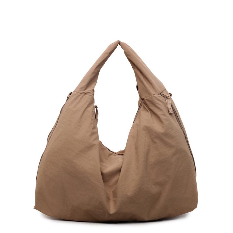 Fashion casual simple commuter tote bag new trend solid color shoulder armpit bag