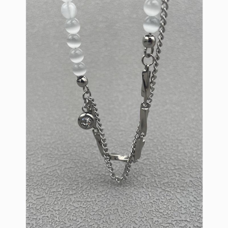 Gage Niche Women's Titanium Steel Necklace with Cat's Eye Stone and Clavicle Chain Trend.