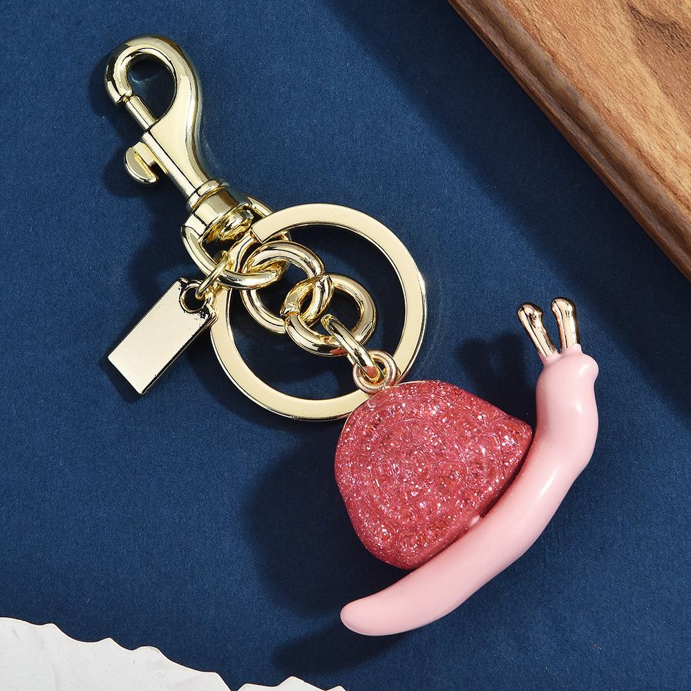 Retro Gold Oil Drop Snail Keychain Multi-Color Glitter Bag Pendant Light Luxury Niche Car Key Chain Versatile Pendant