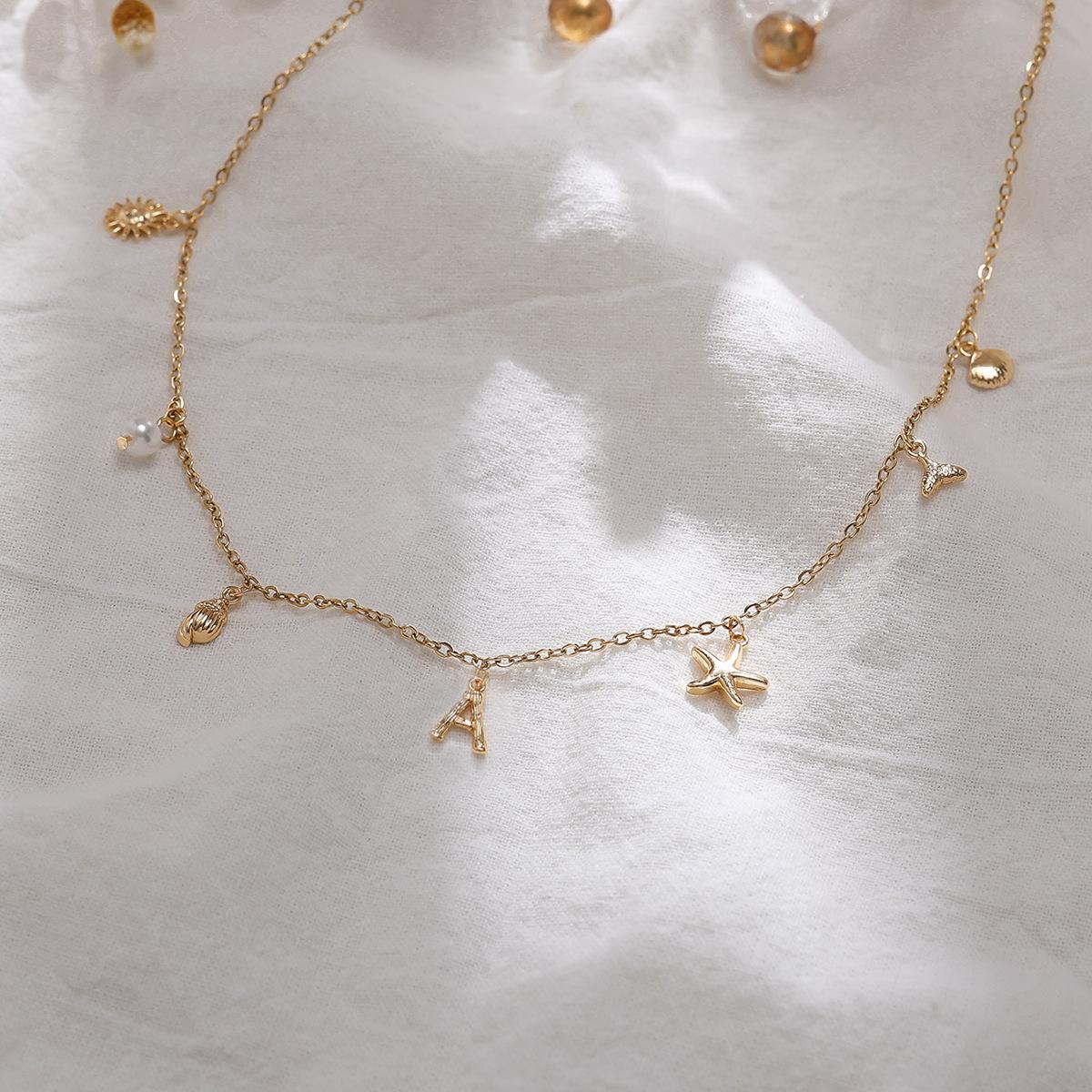 Explosive Ocean Letters A-Z Gold Letters Pearl Necklace Ocean Shell Starfish Conch Decoration