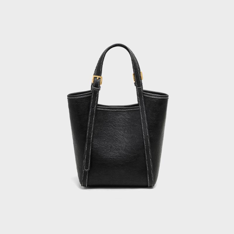 2025 New Black Leather Bucket Bag Autumn Winter Handheld Basket Commuter Crossbody Bag Niche High-End Women's Bag