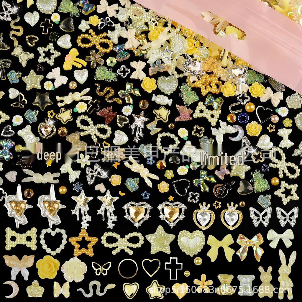 650PCS Mixed Nail Art Kit: Bows, Chrome Hearts, Pearls, Rivets, and Fairy Style Colors.