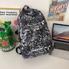 Schoolbag Backpack Men's 1 Trend Graffiti ins Large Capacity Fashion Printing Student Women's Backpack Waterproof and Wear-resistant White Ditch