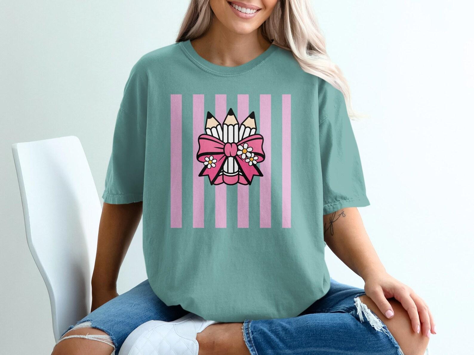 Pink Bow Pencil Teacher T-Shirt, Back to School Educator Apparel, Stationery Art Lover Top M
